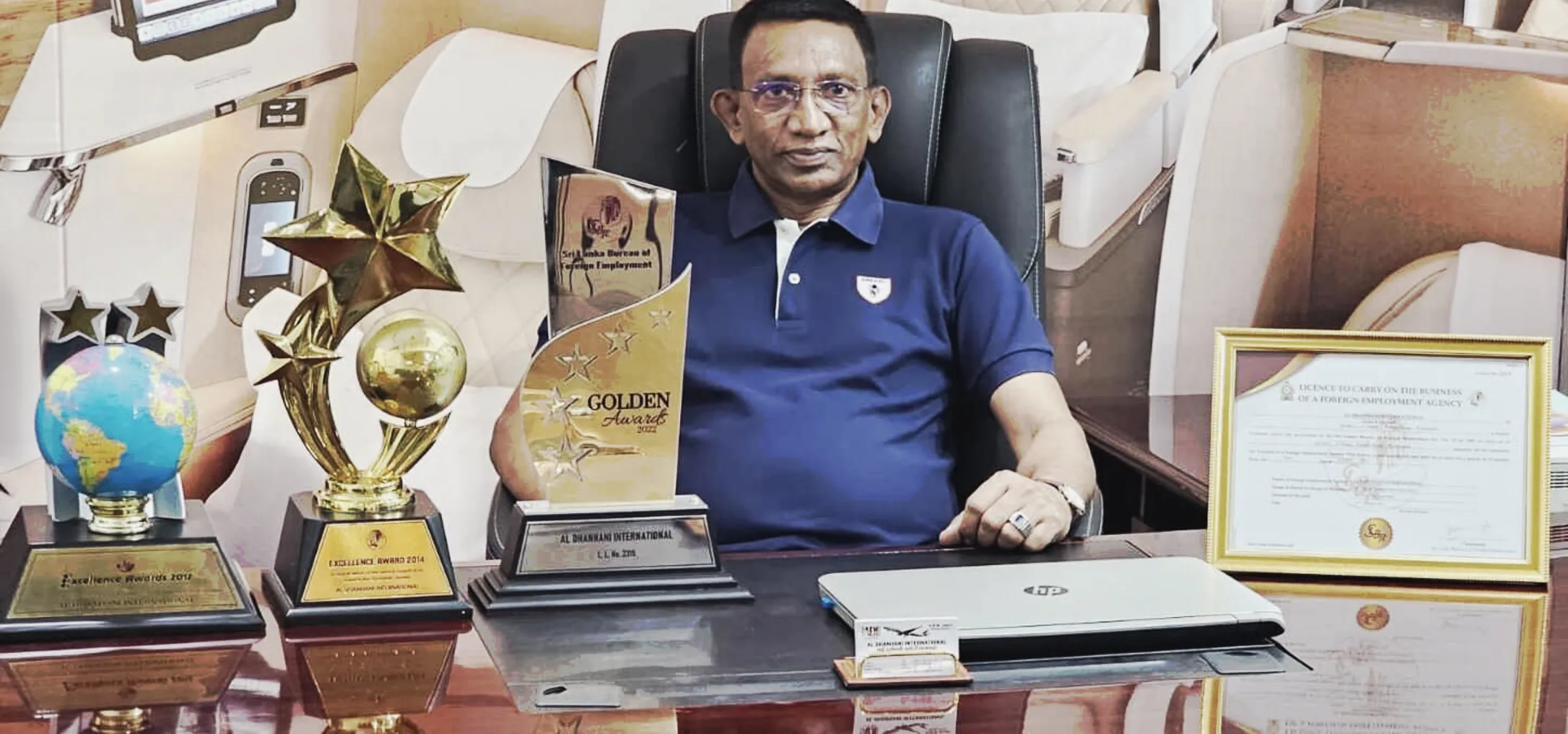 H.M.M. Jesmi, Managing Director of Al Dhanhani International, at his desk in Kurunegala with the agency's SLBFE awards and agency licence.